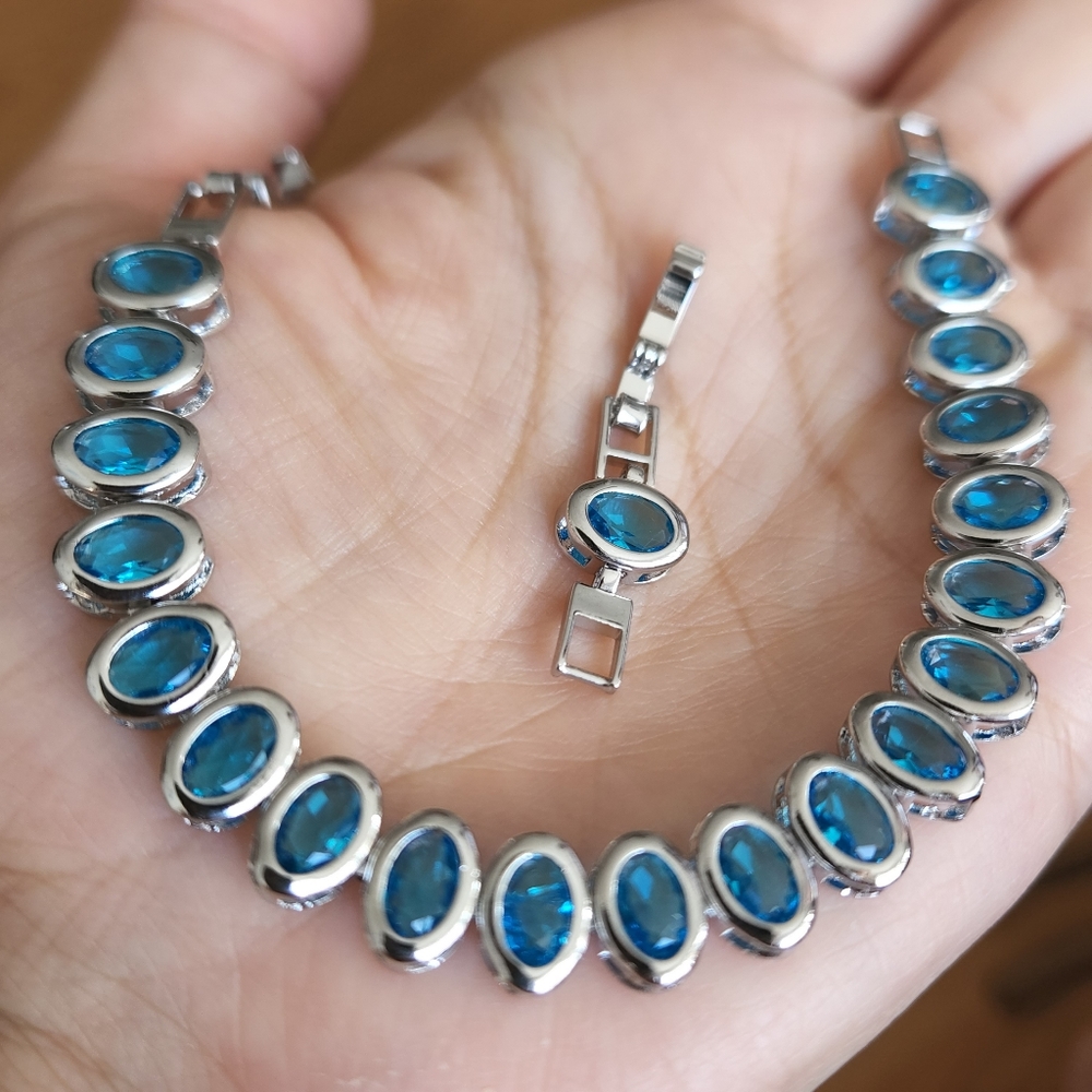 New 925 Silver Oval Cut Sky Blue Sapphire Bezel Setting Bracelet for Women